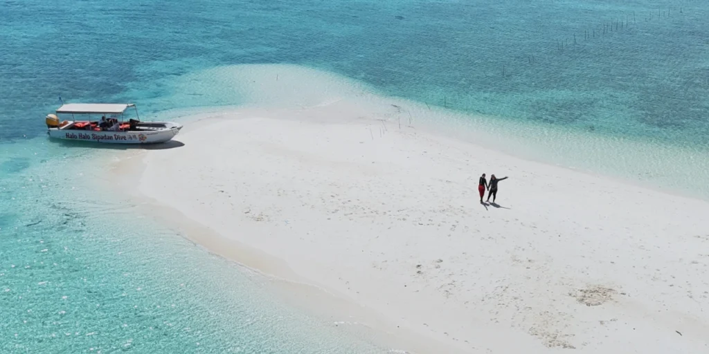 Couple strolling in the island of Semporna