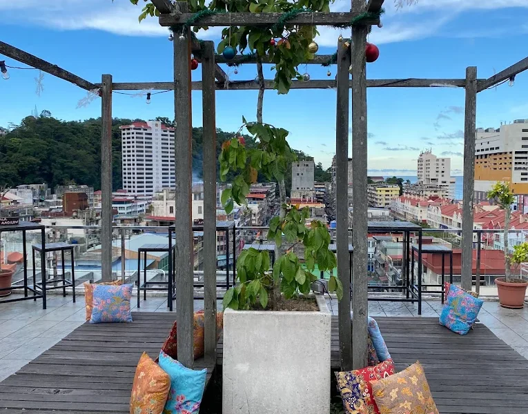 Exterior view of Barlin Rooftop in Sandakan, featuring an open-air dining area