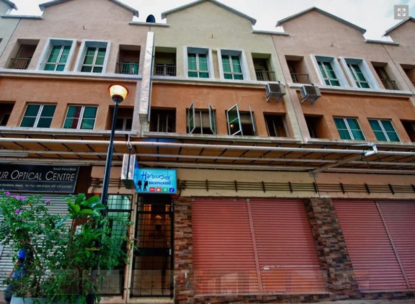 Exterior view of Harbourside Backpackers in Sandakan, a budget-friendly accommodation ideal for solo travelers.