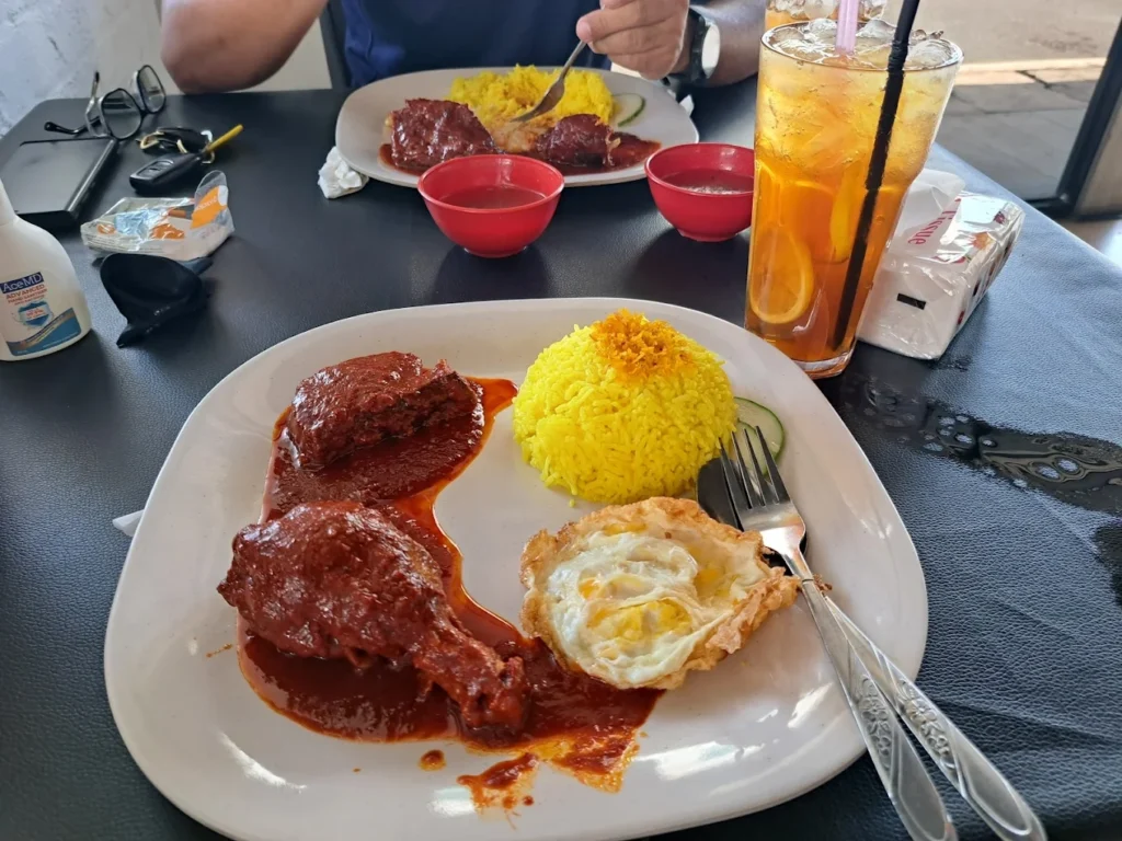 The Best Sandakan Guide for Solo Travelers in 2025: Safety, Budgeting & Experiences 18 Nasi Kuning (at Restoran Haji Tamrin Istimewa)
